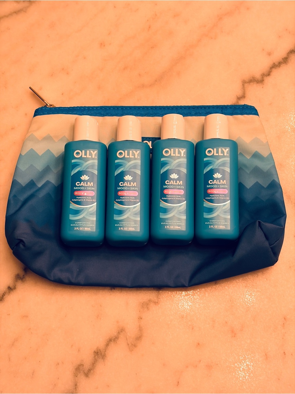 Olly Calm Mood + Skin Travel BodyWash lot of 4 + Coola Blue Beauty Pouch